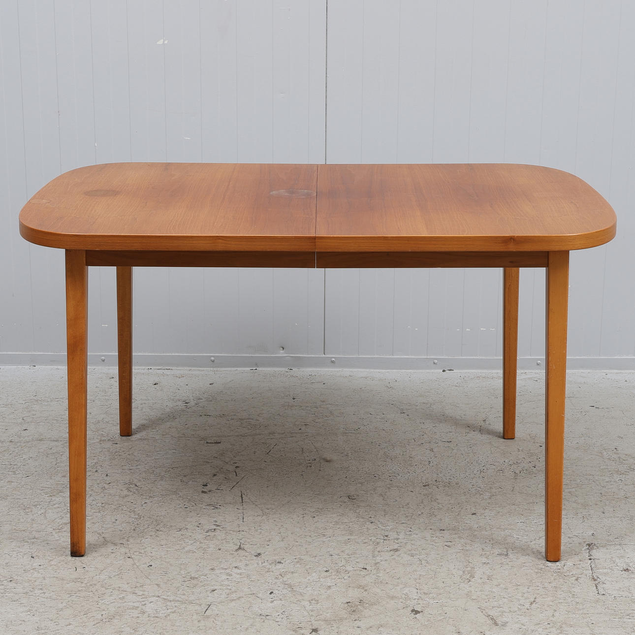 A dining table, teak veneer, 1950s/60s.