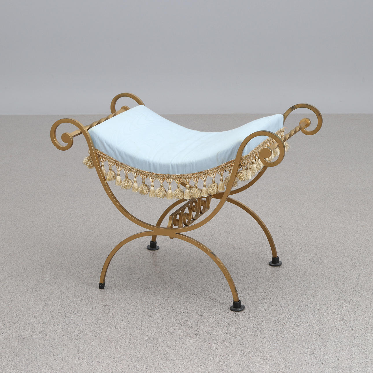 STOOL. Bronzed forging. 20th century.