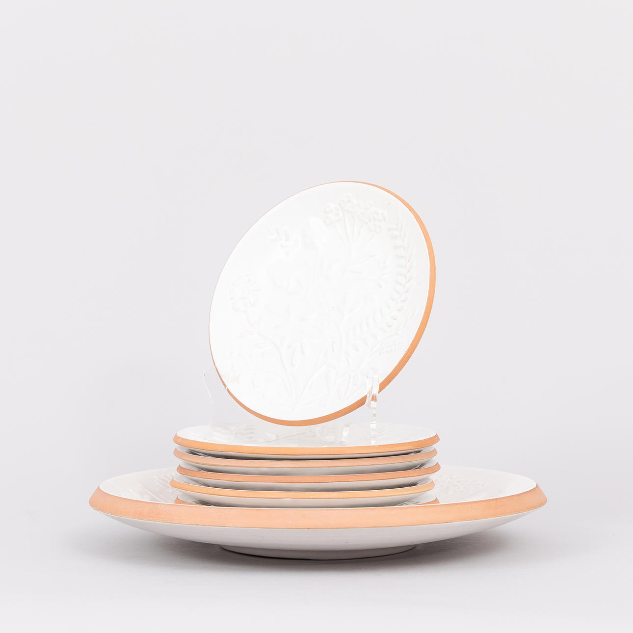 A 7-piece fruit set, partly glazed earthenware, Nittsjö.