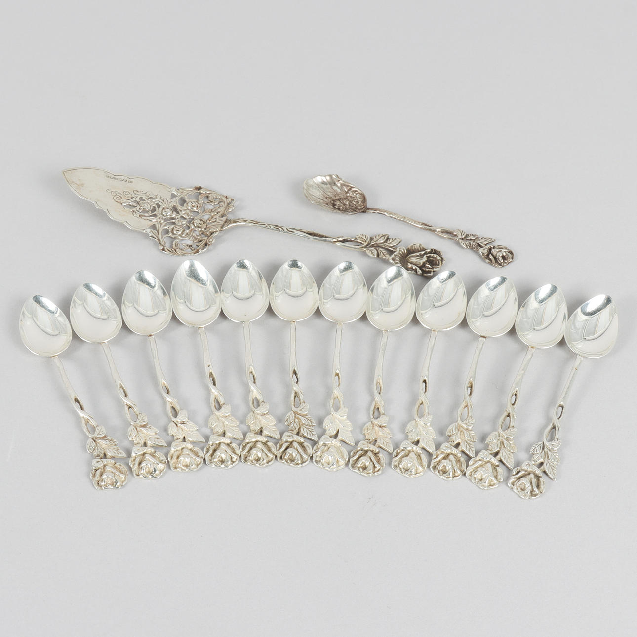 COFFEE SPOONS AND CAKE SPADE, silver, “The Rose”.