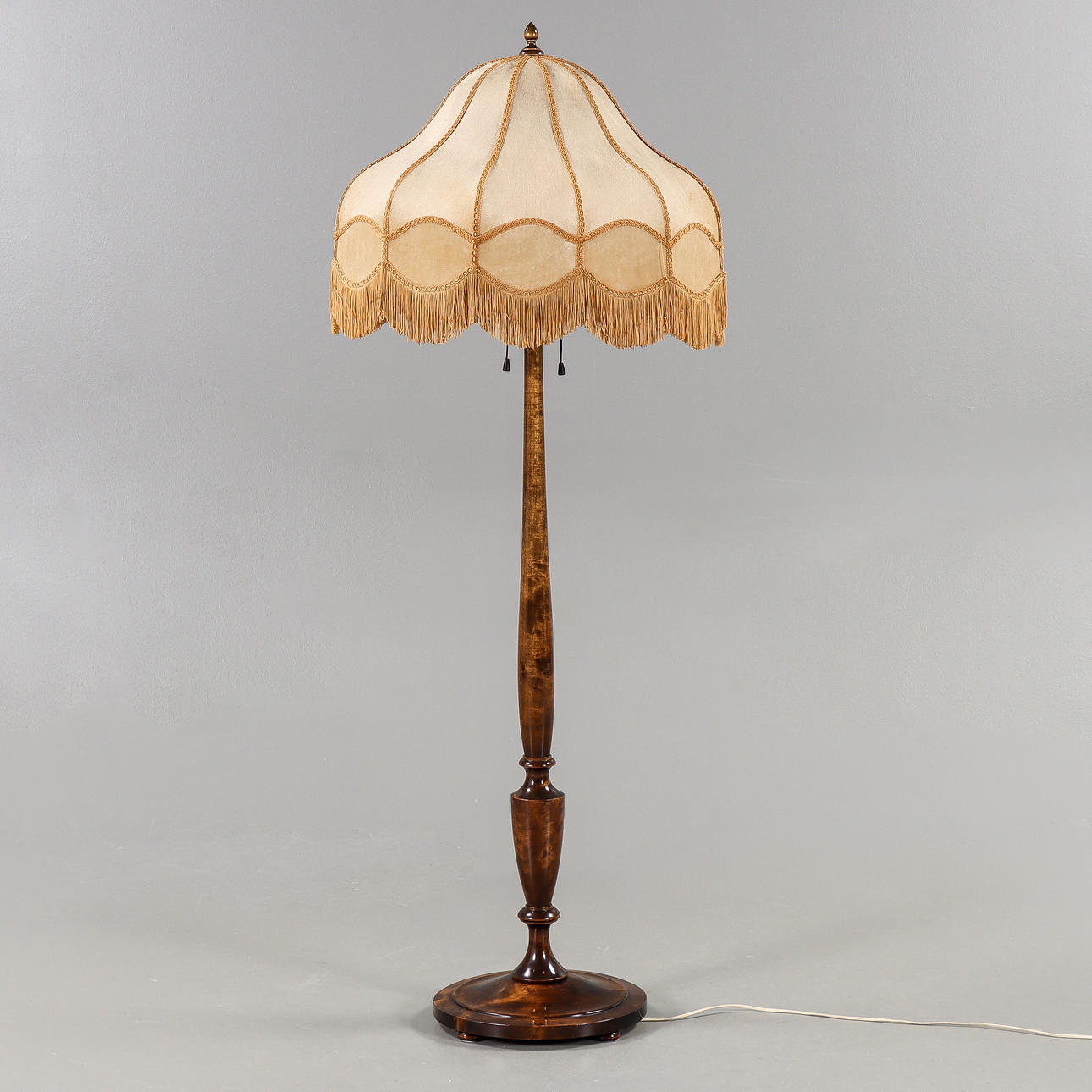 A 1930s Birch floor lamp.