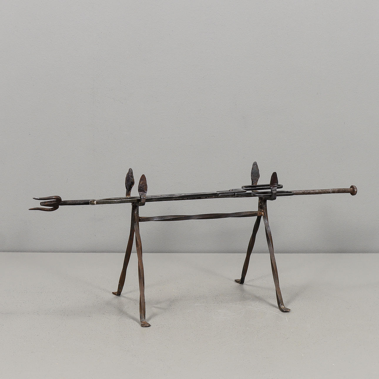 FORGE rack, fire fork and fire pliers.