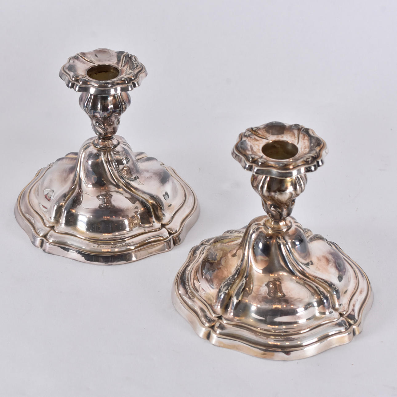 A pair of silver candlesticks, 20th century.