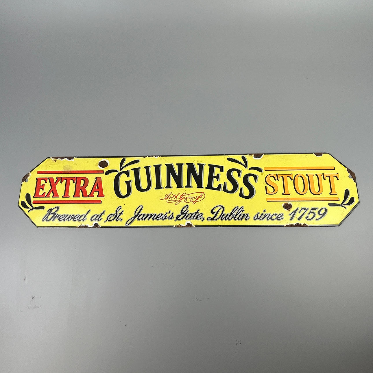 ENAMELLED METAL ADVERTISING SIGN.