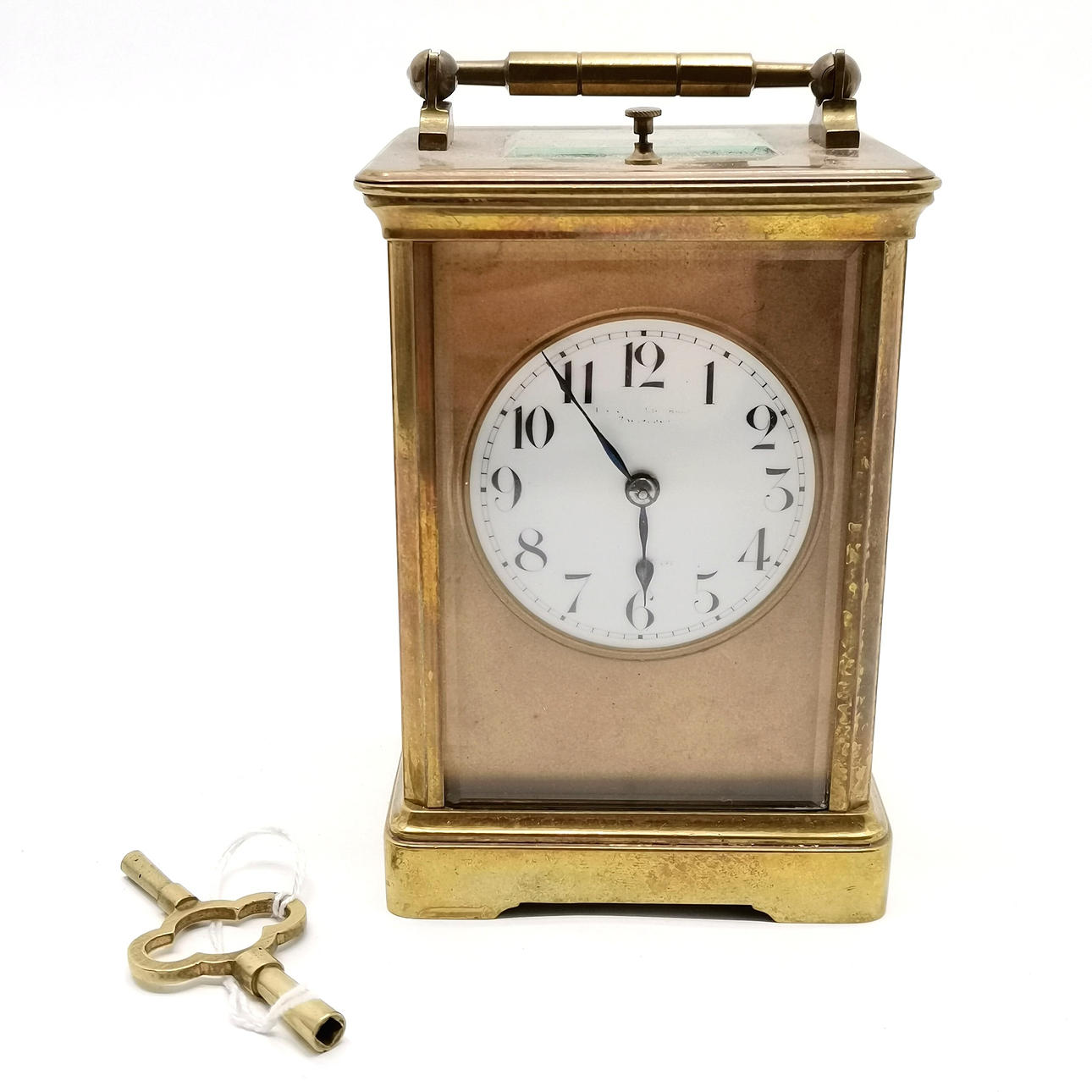 ANTIQUE BRASS CARRIAGE CLOCK WITH REPEAT MECHANISM.