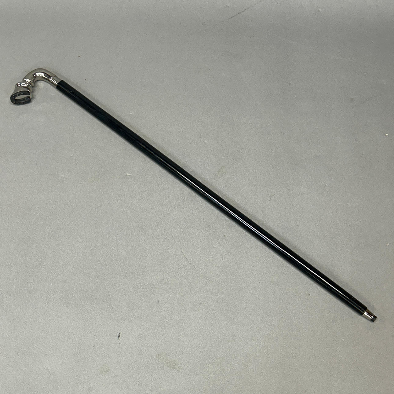 METAL HANDLE WALKING STICK.