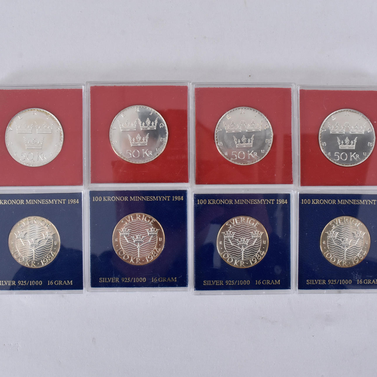8 STERLING SILVER COMMEMORATIVE COINS.
