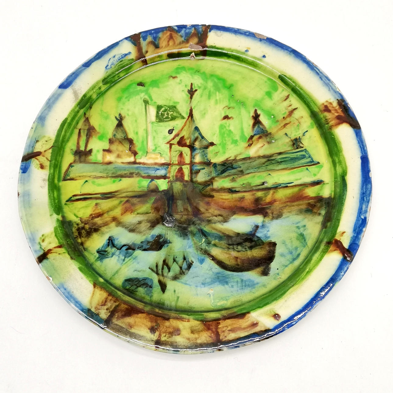 EASTERN DECORATIVE TERRACOTTA CHARGER.