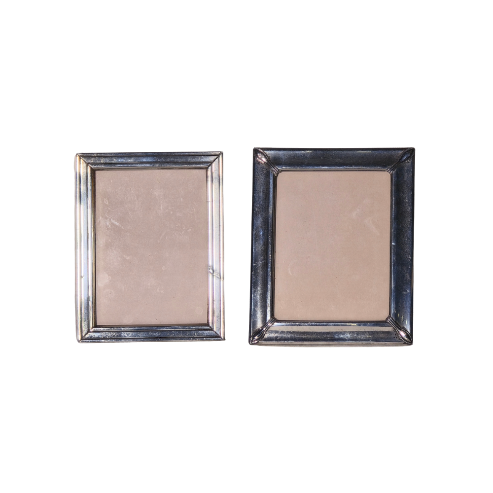 TWO SILVER FRAMES.