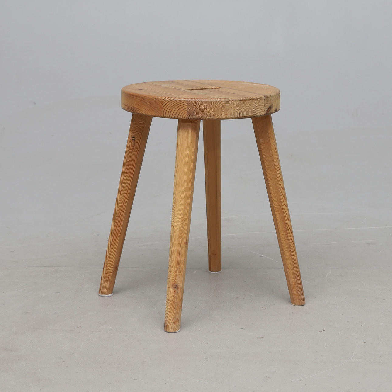 A pine stool, second half of the 20th century.