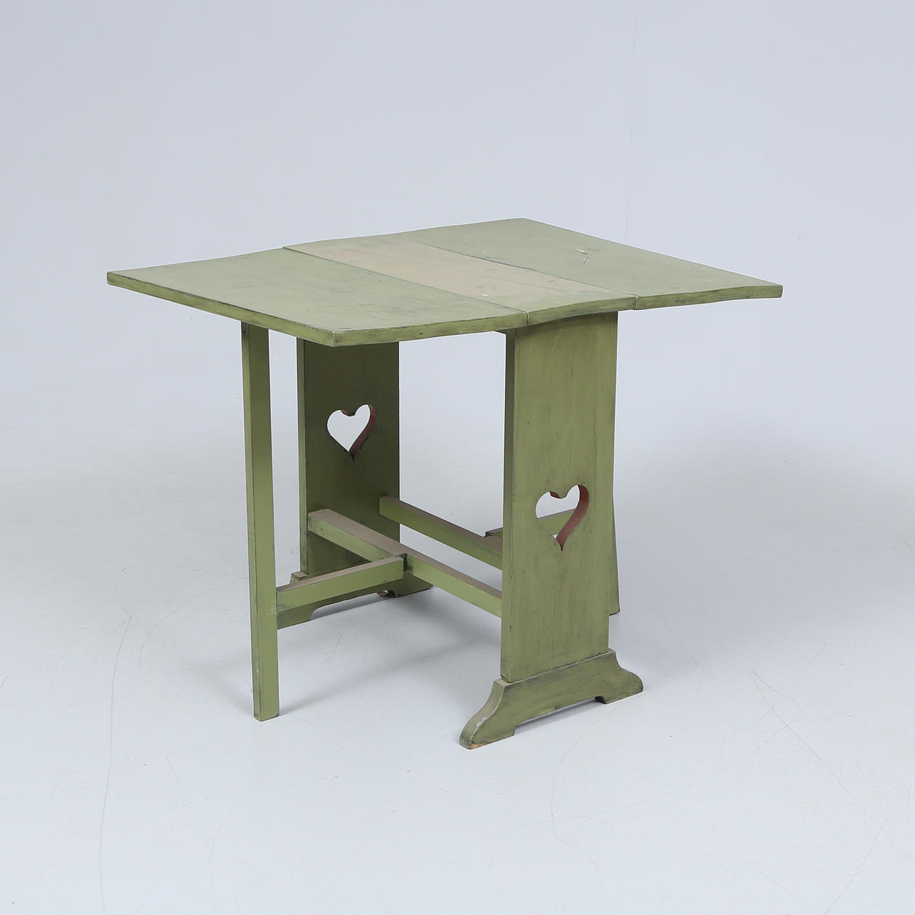 A painted folding table, early 20th century.