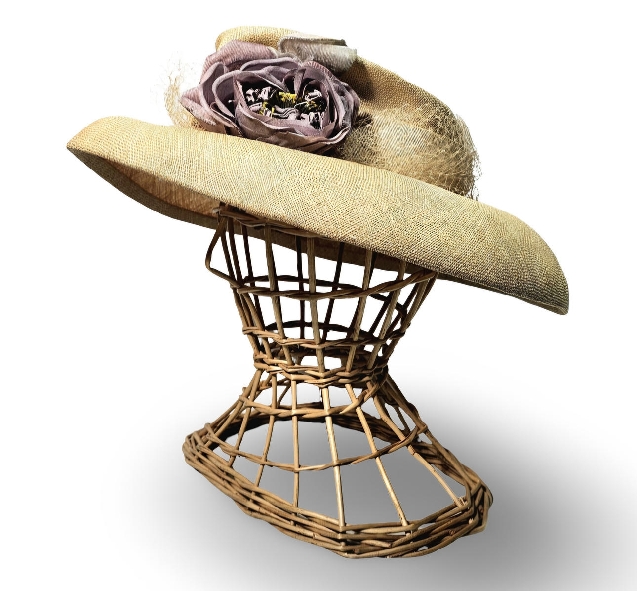 Handcrafted raffia sun hat with lavender-colored flower.