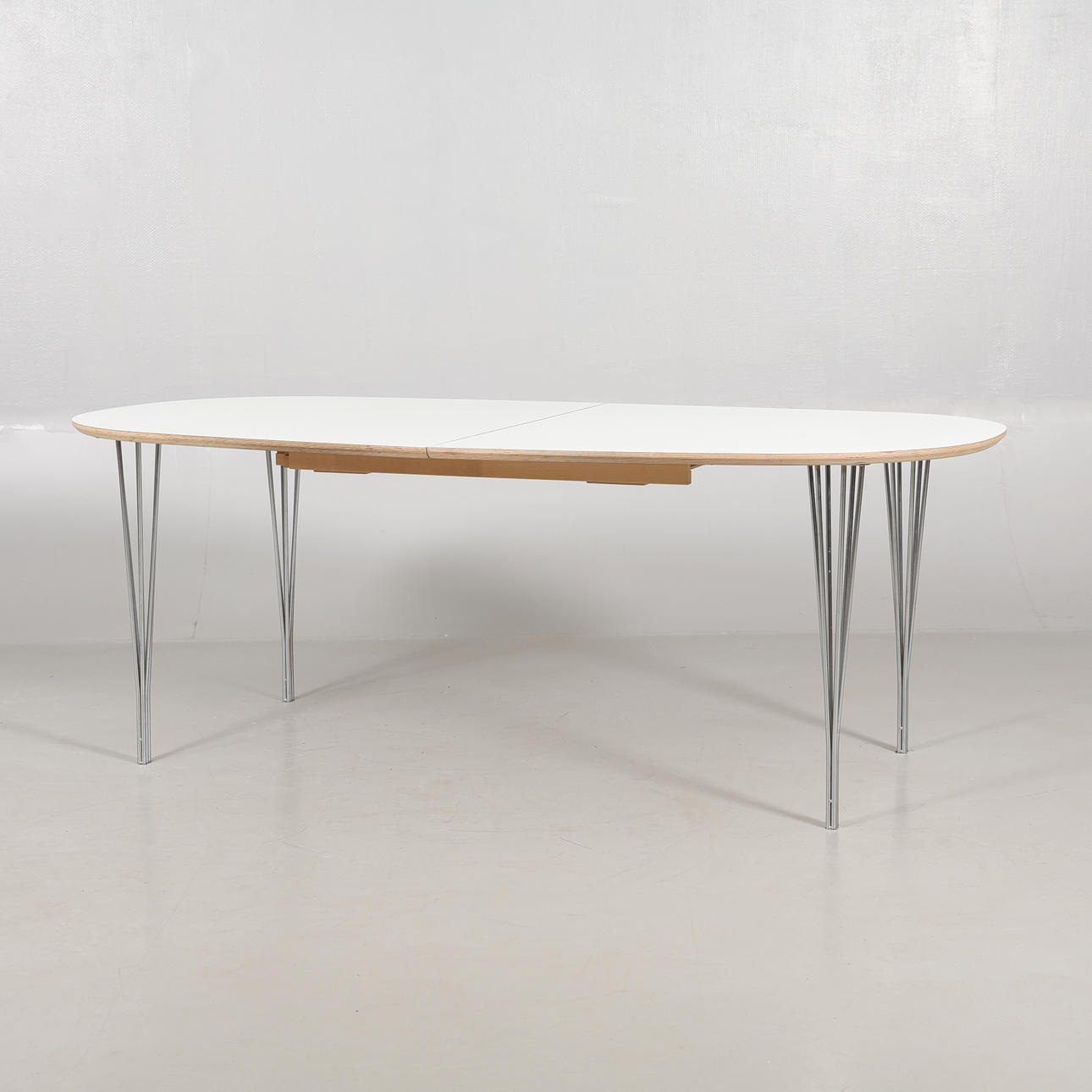 DINING TABLE, Haslev Møbelfabrik, Denmark. Brick- and label-marked. It's contemporary.