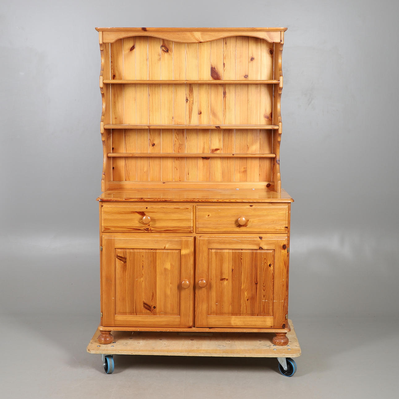 A MODERN PINE DRESSER.