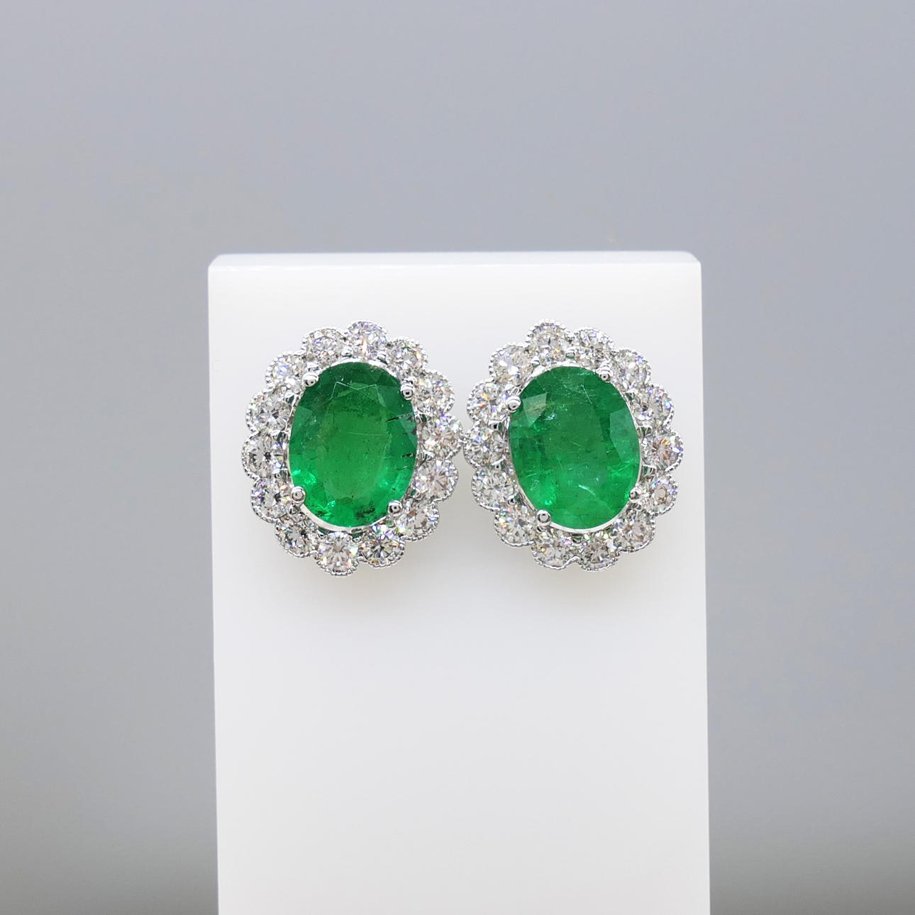 EMERALD & DIAMOND cluster ear studs.