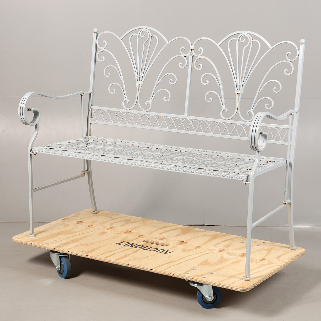 A GREY PAINTED GARDEN BENCH.