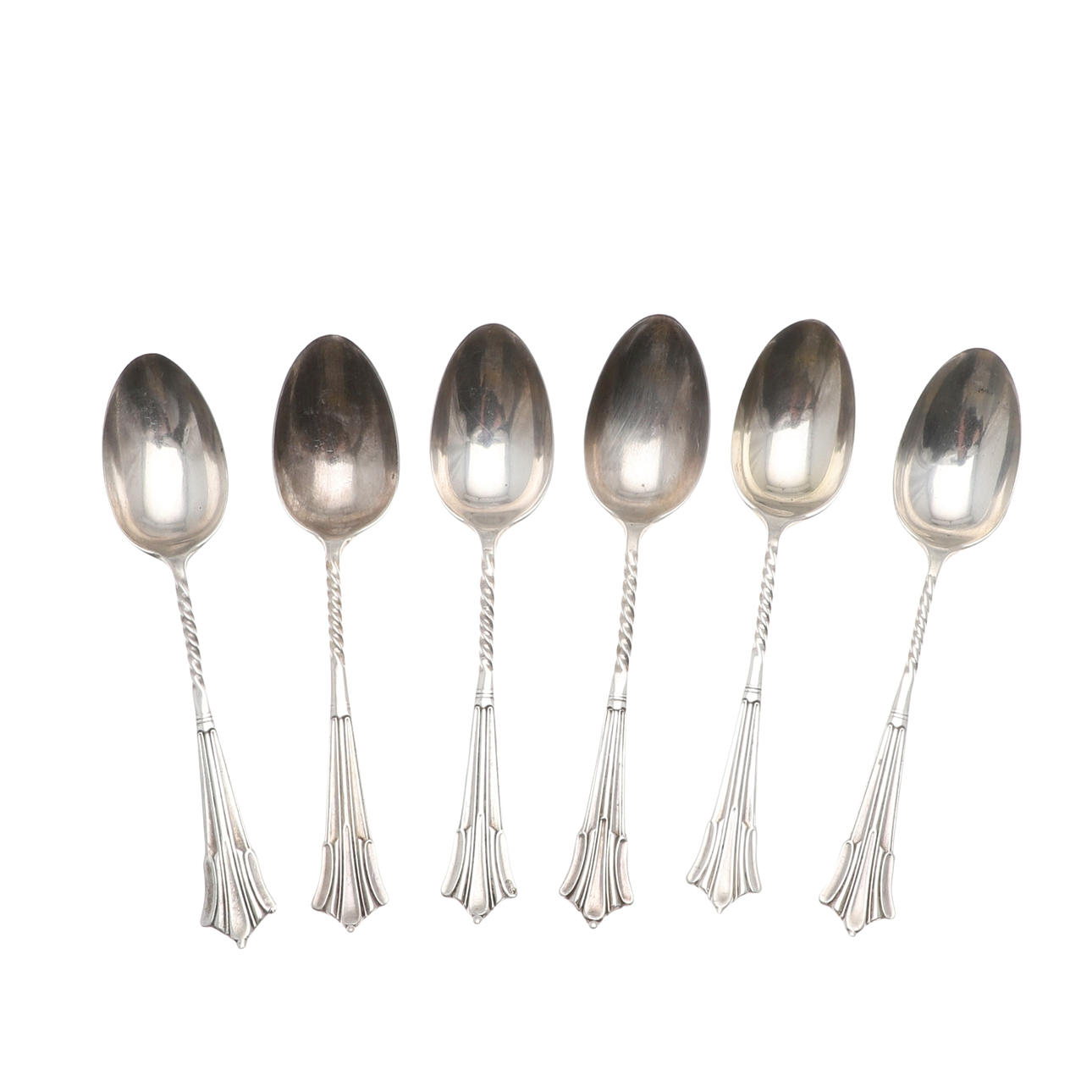 A SET OF SIX SILVER ALBANY PATTERN TEASPOONS.