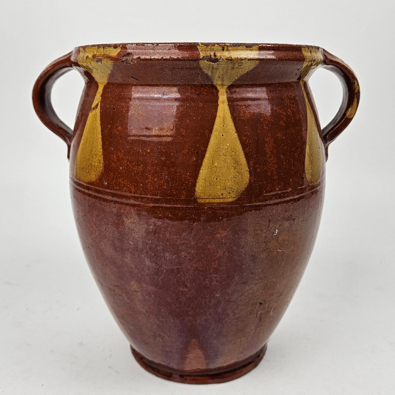 A 19th century ceramic mug.