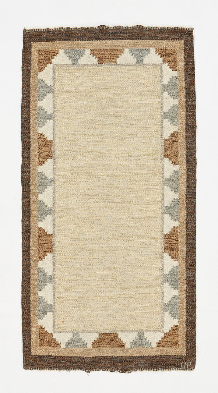 ULLA PARKDAL. Carpet, wicker, signed UP.