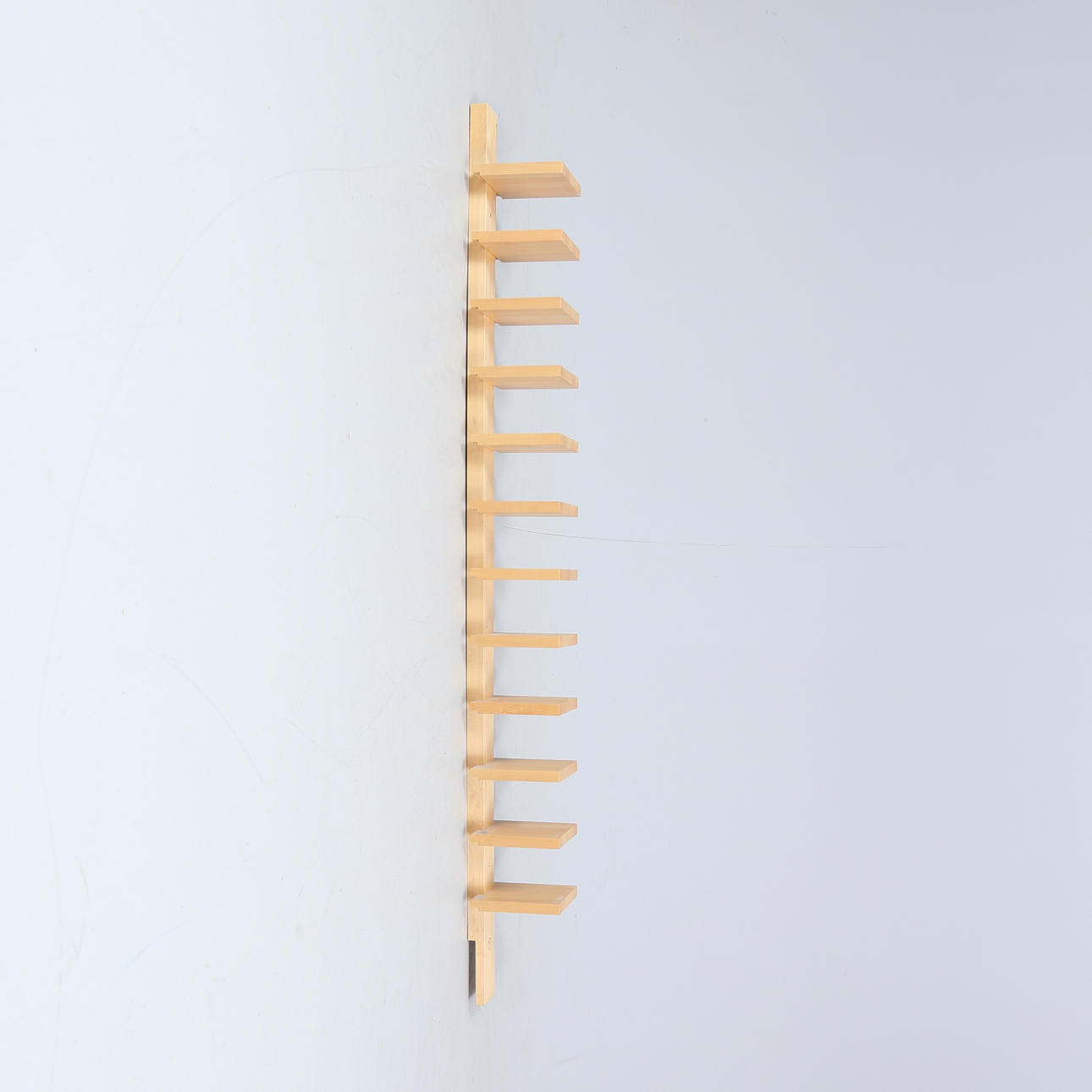 JOHN CANDELL. A shelf, “Pilaster”, Källemo, designed 1989.