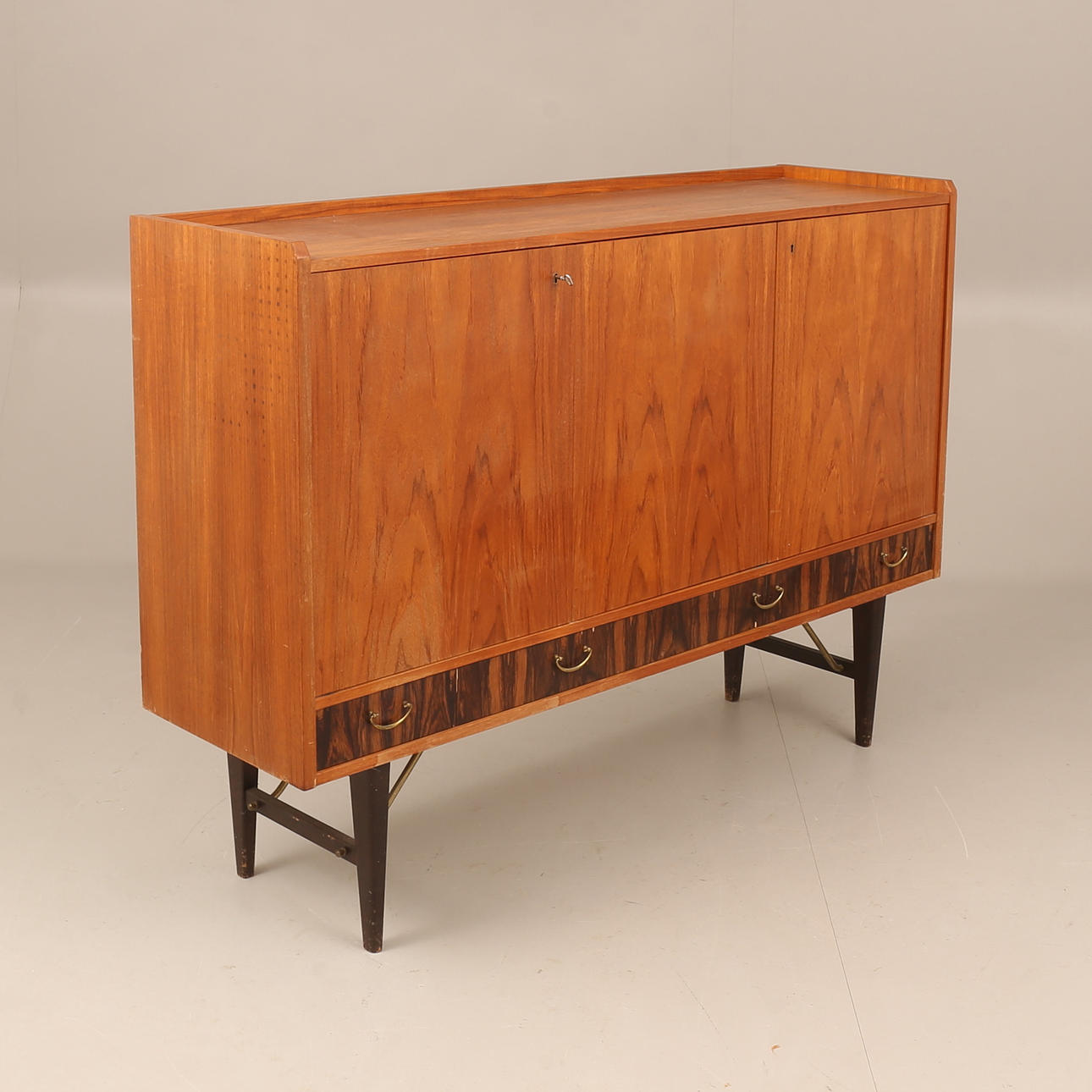A 1960's teak sideboard.