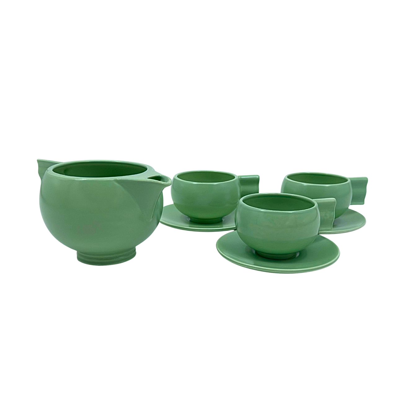 SEVEN-PIECE CERAMIC SERVICE IN GREEN.