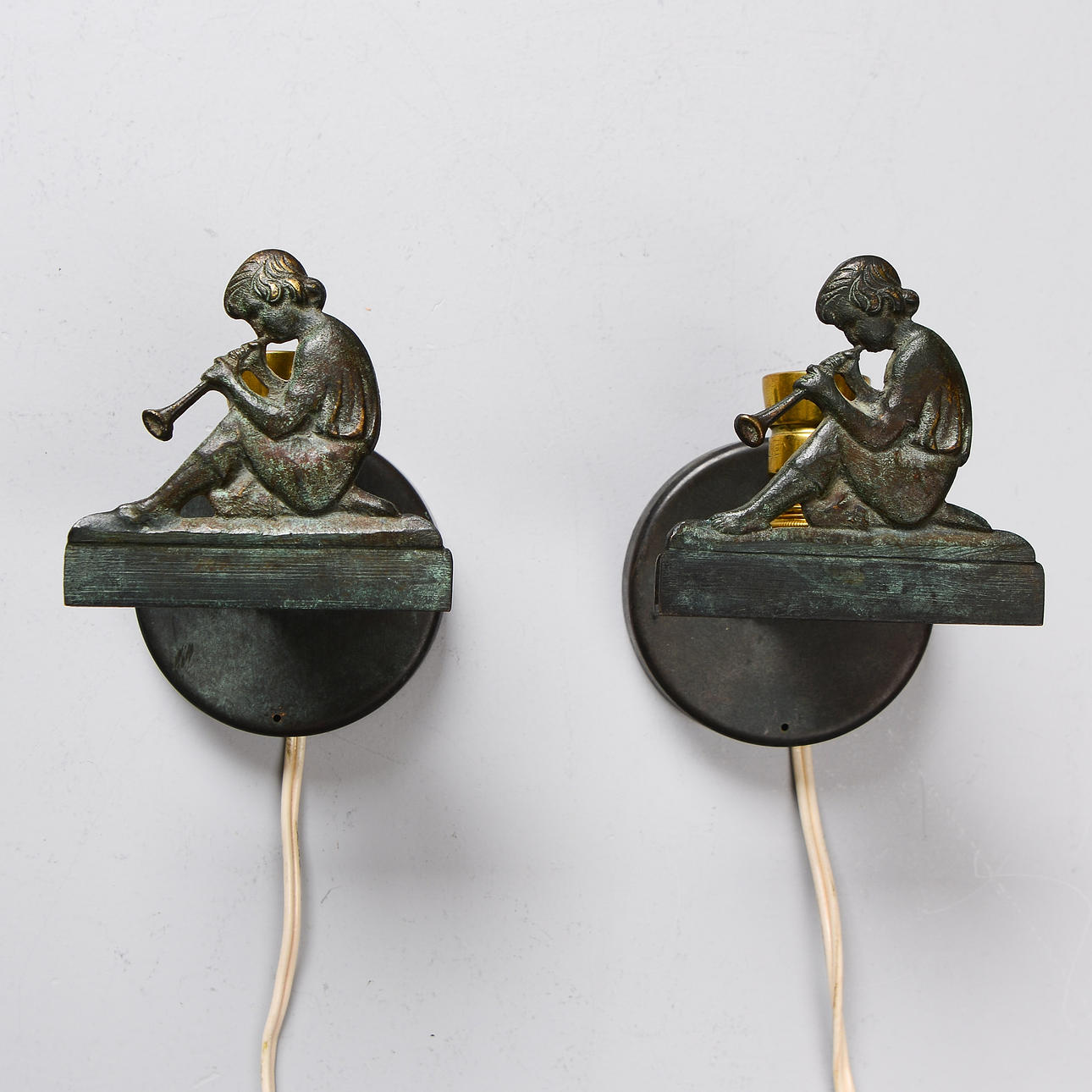 Two bronze wall lamps, art deco, 1930's.