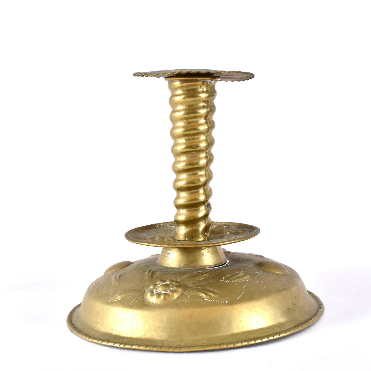 A brass candlestick, 18th century.
