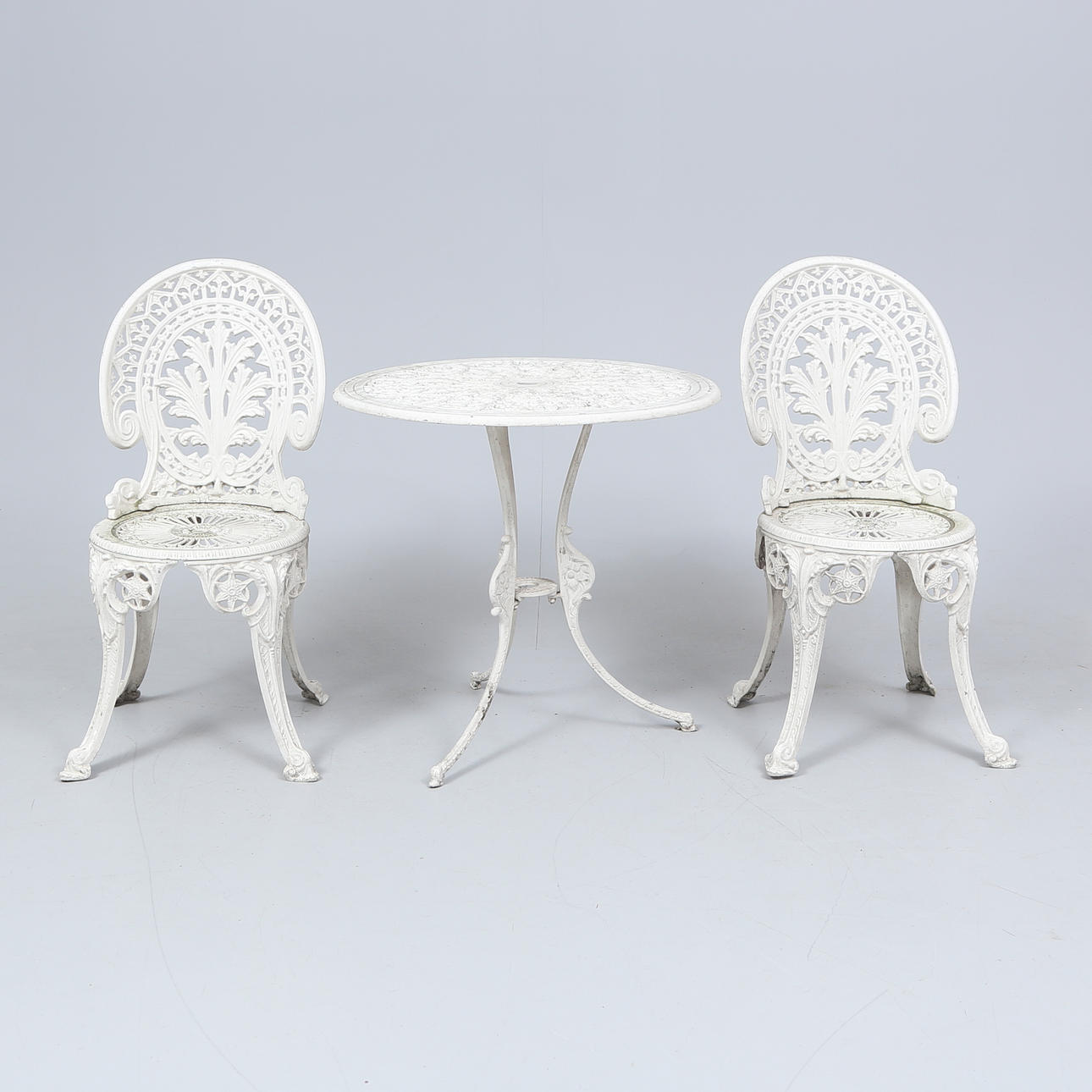 GARDEN GROUP, 3 pieces, cast metal.