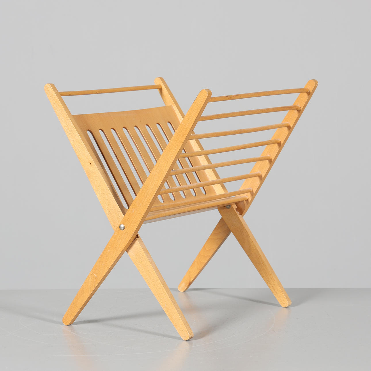 A 20th century magazine rack.