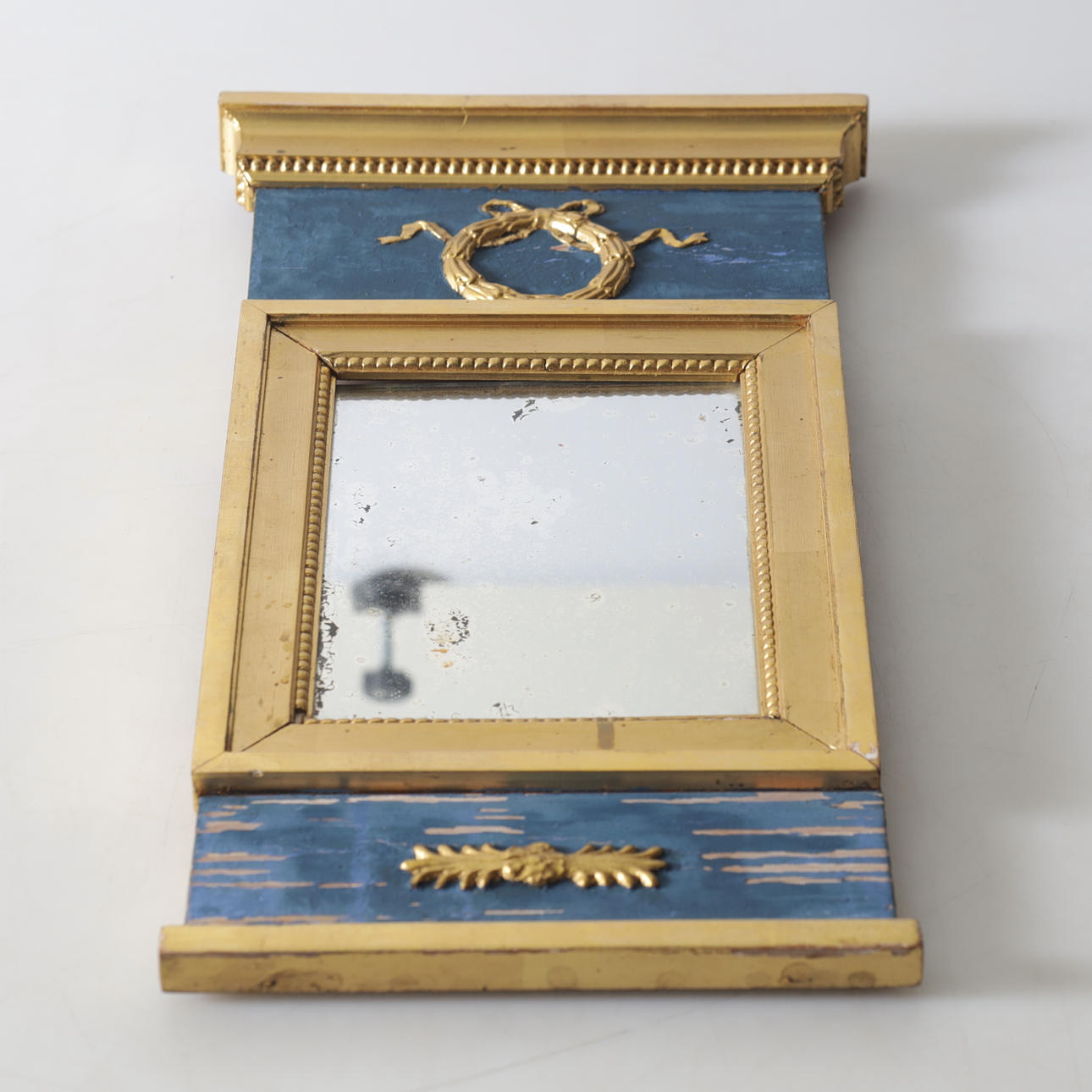 A 19th/20th century Empire style mirror.