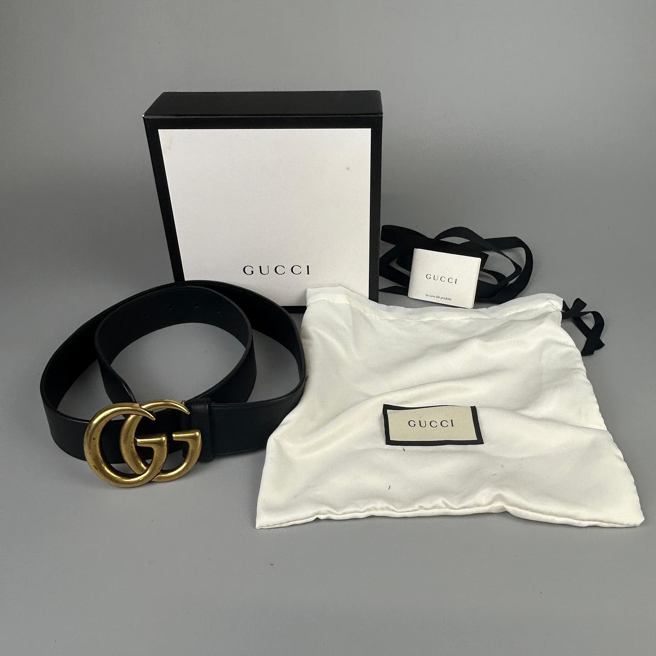 BOXED GUCCI BELT.