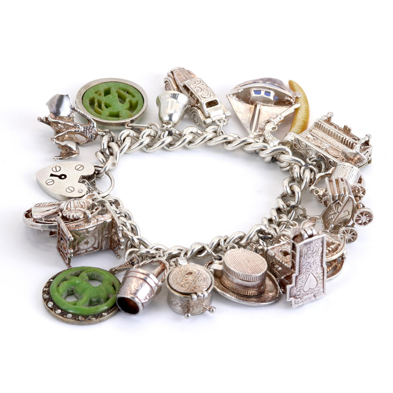 HEAVY SILVER CHARM BRACELET.