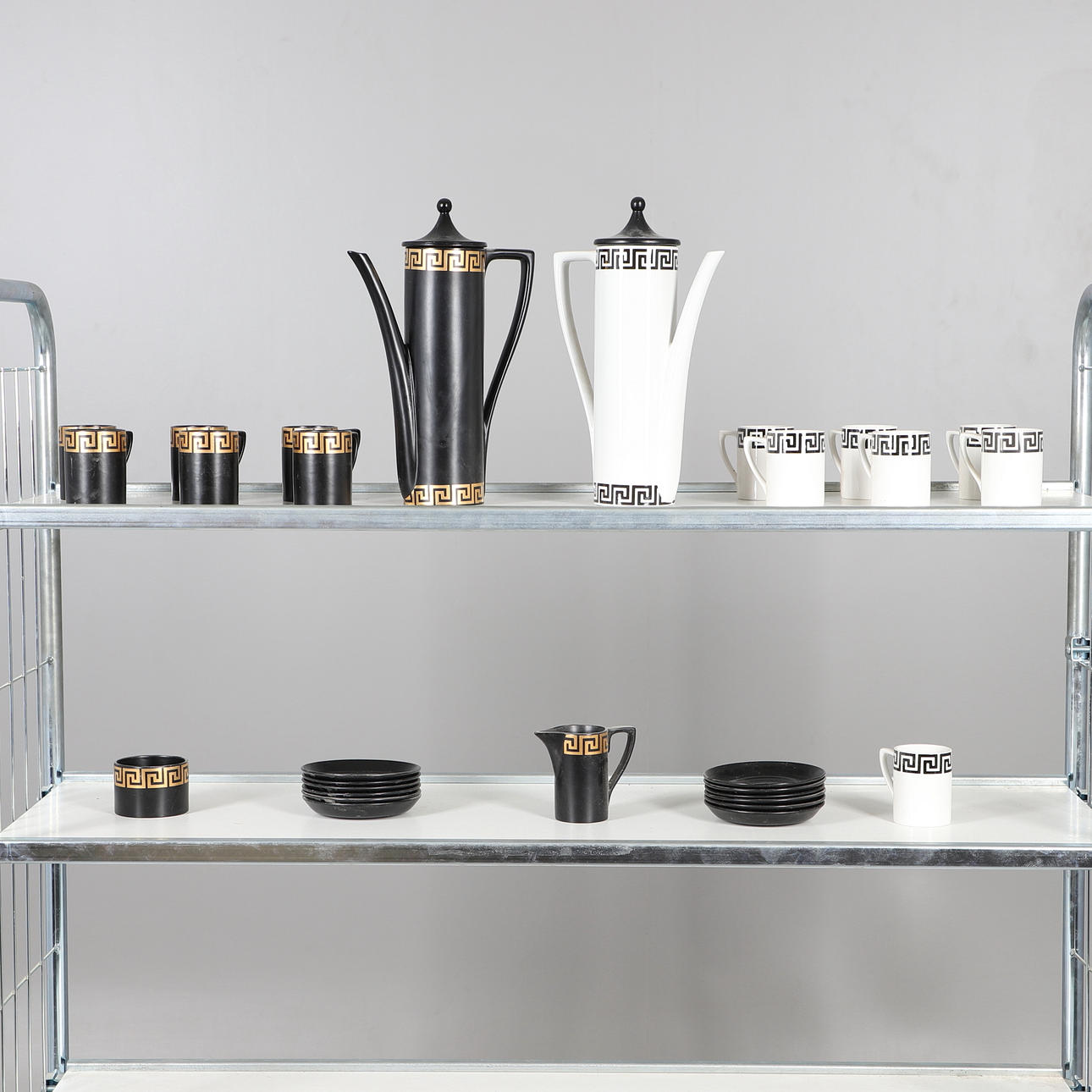 TWO PORTMEIRION GREEK KEY COFFEE SETS.