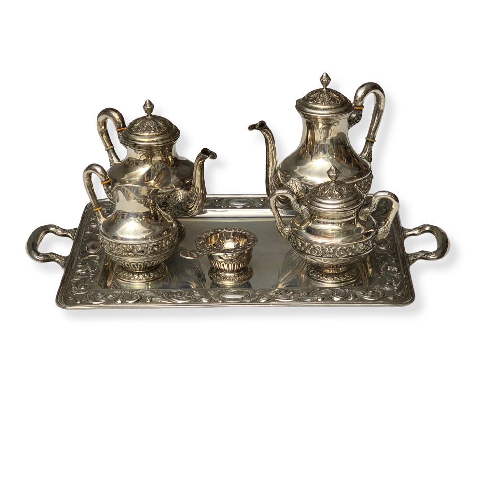 COFFEE AND TEA SET IN SPANISH PUNCHED SILVER.
