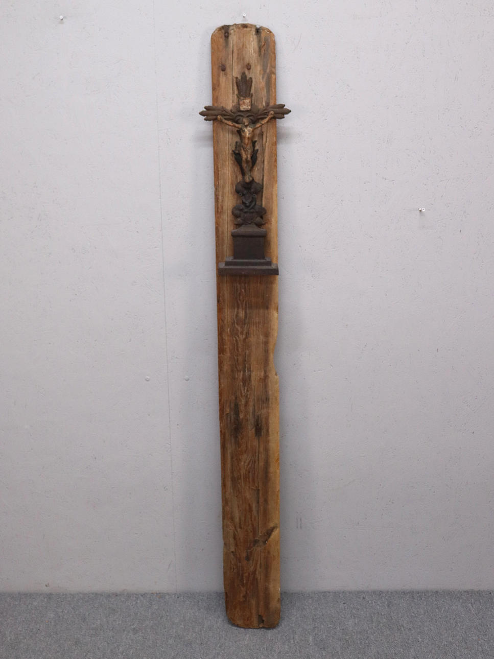 CRUCIFIX mounted on decorative board.
