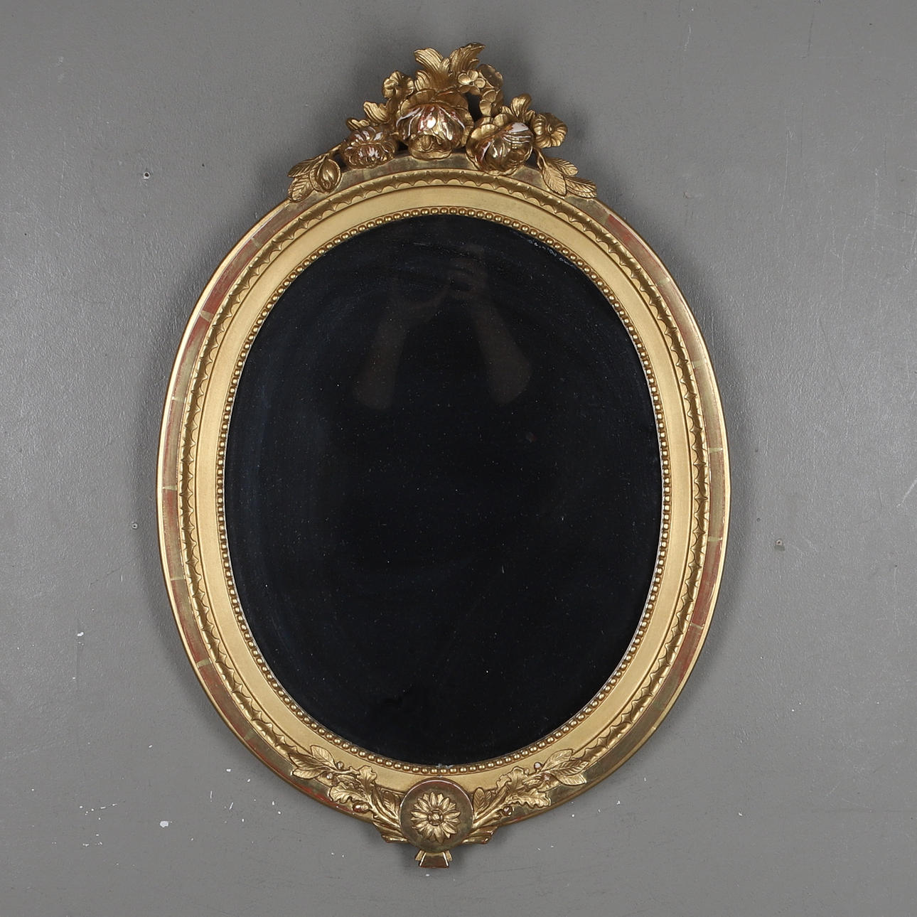 A Gustavian-style mirror, 20th century.