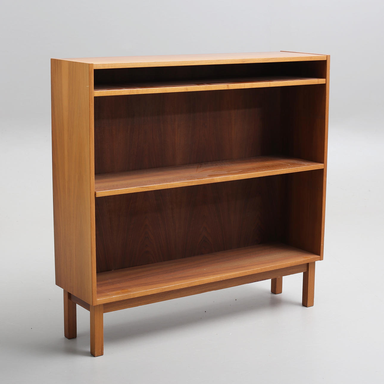 A 20th century wooden bookcase.