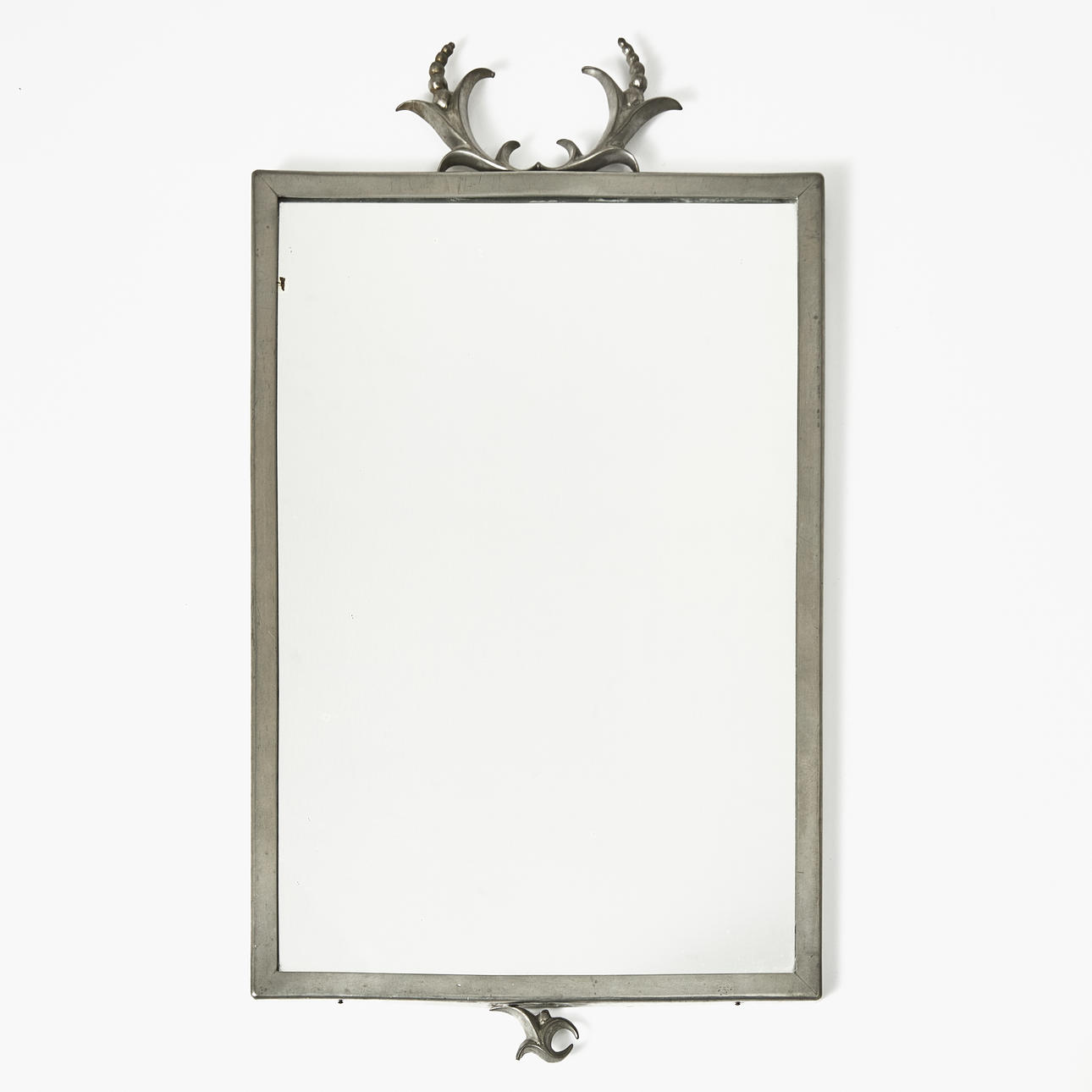A pewter mirror, 1920/30s.