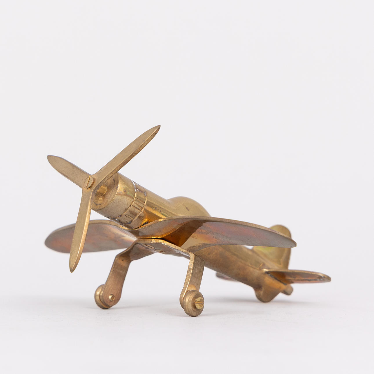 A brass Spitfire aeroplane, 20th century.