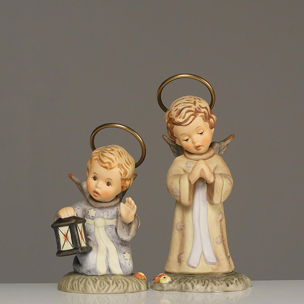 Two porcelain figurines, angels, Berta Hummel, Goebel.