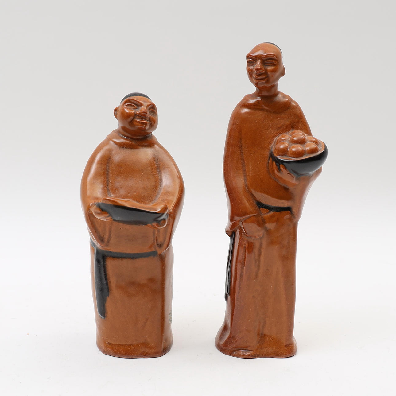 DOROTHY CLOUGH. Doughnuts, a pair, glazed ceramic, signed.