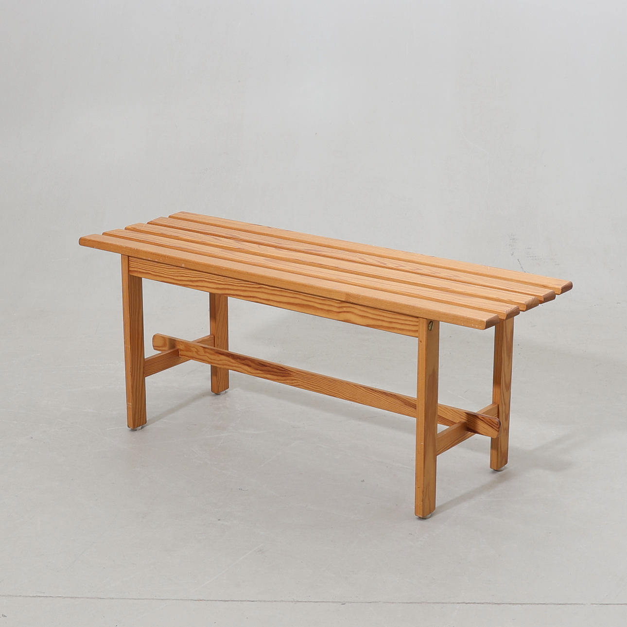 A 20th century pine bench.