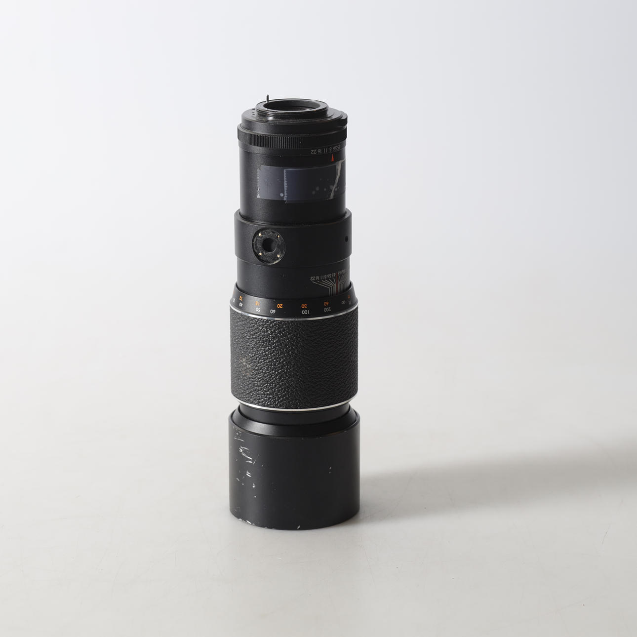A 20th-century CHINON CAMERA LENS.
