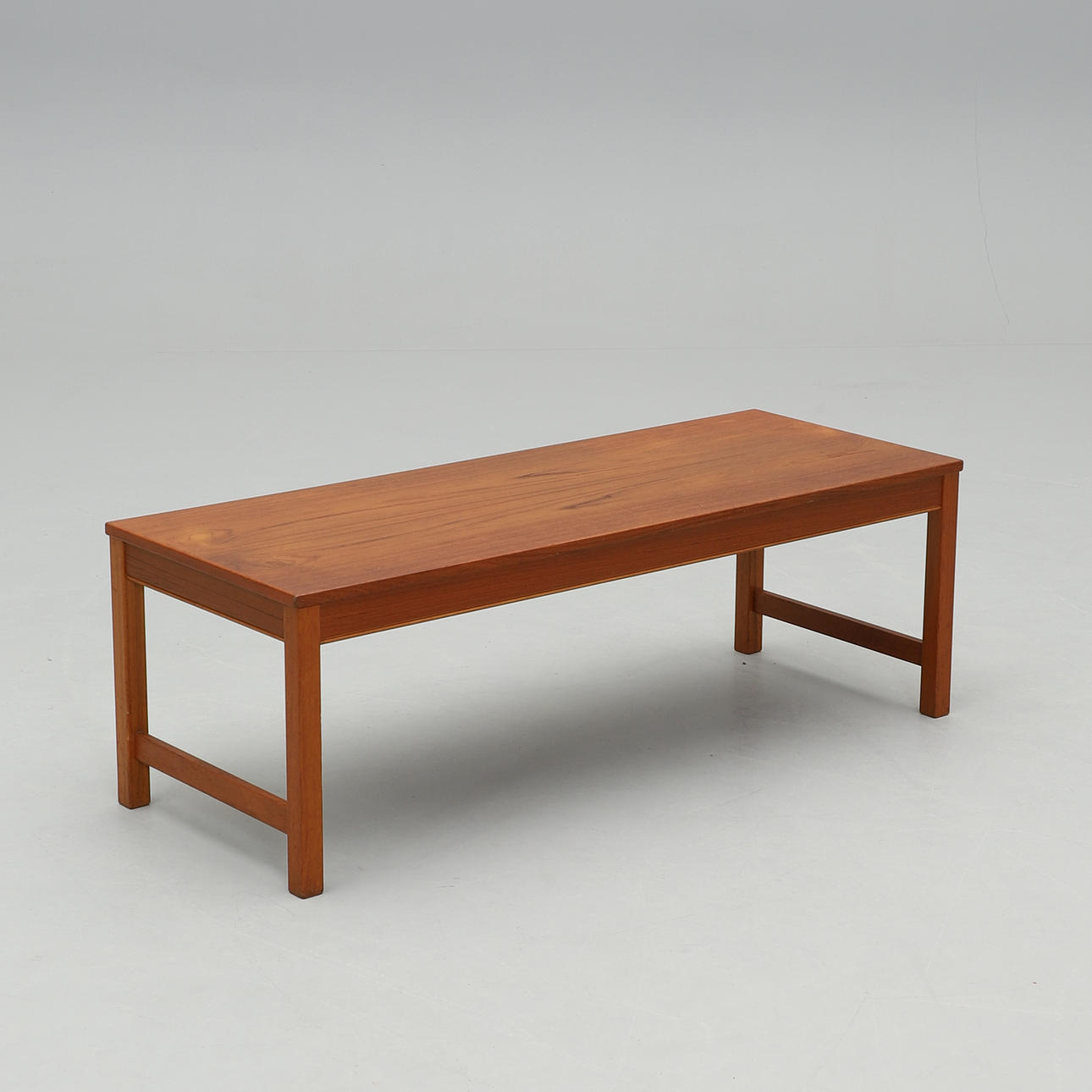 A 1950s/60s teak bench.
