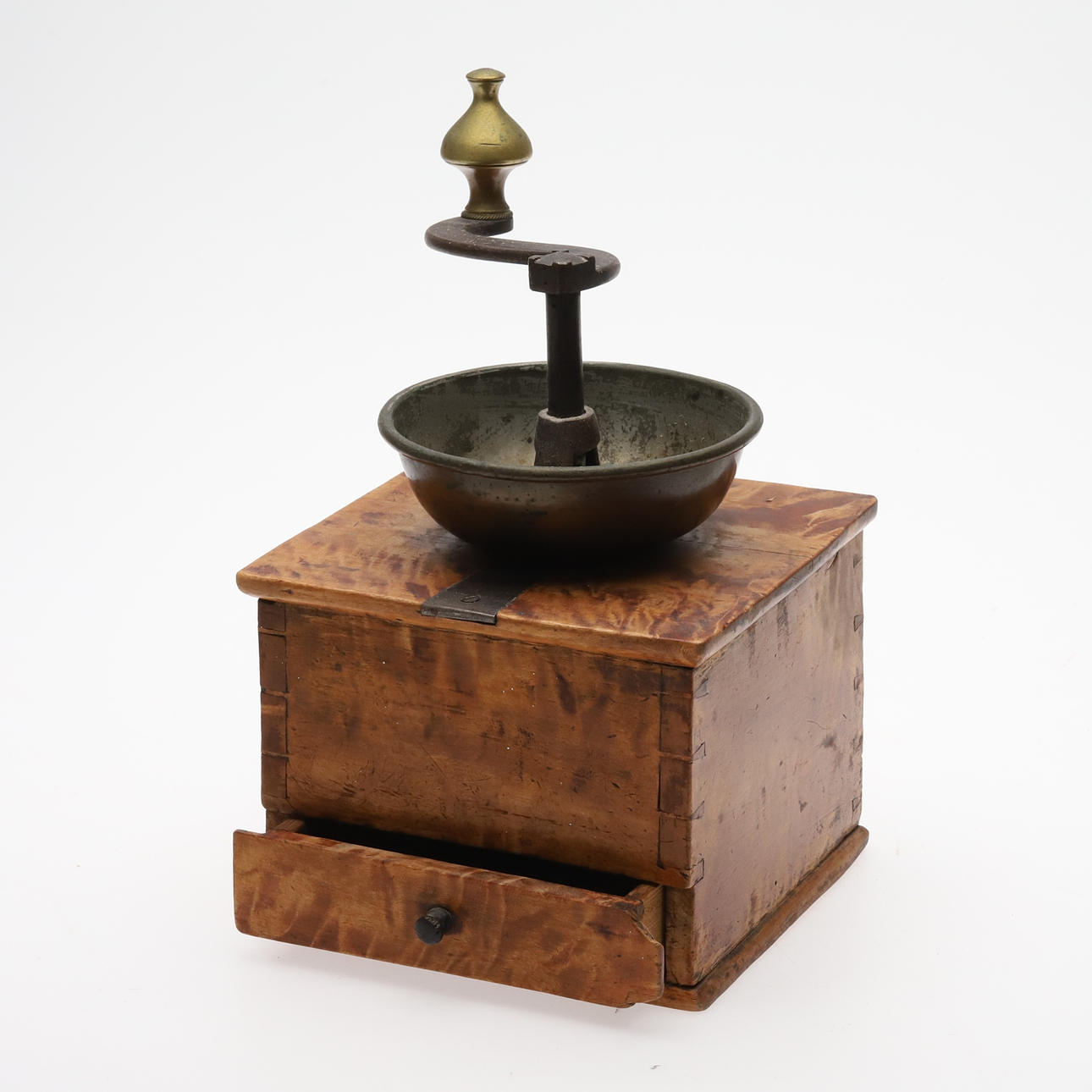 COFFEE GRINDER. An 18th/20th century flame birch log.