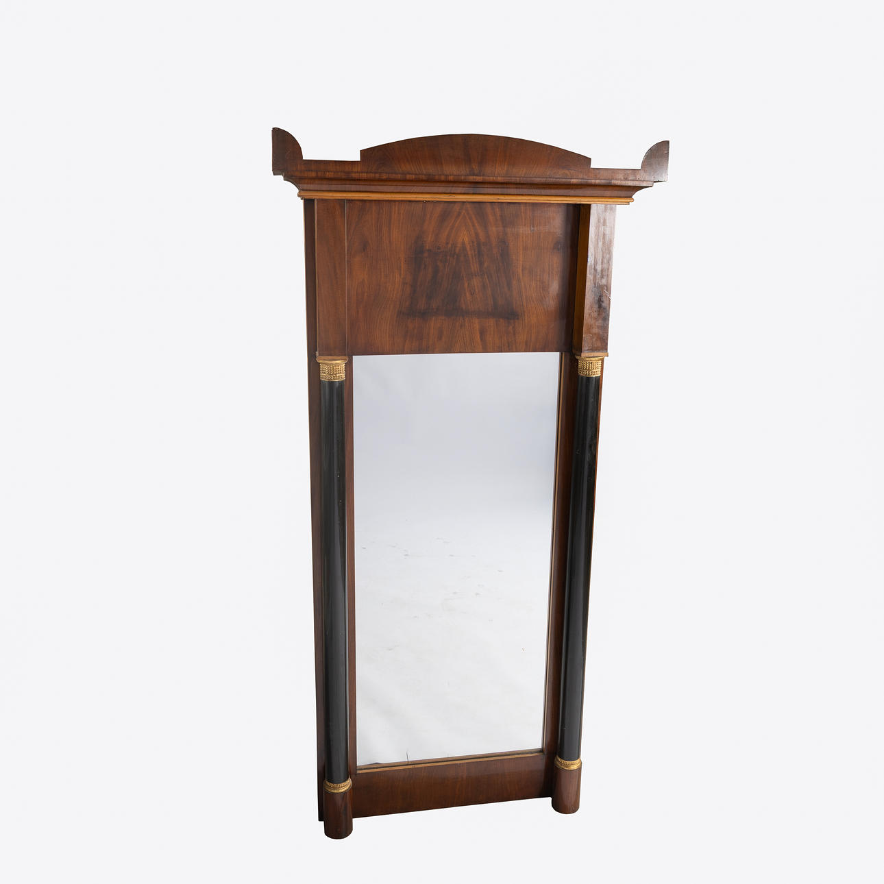 An empire mirror, 19th century.