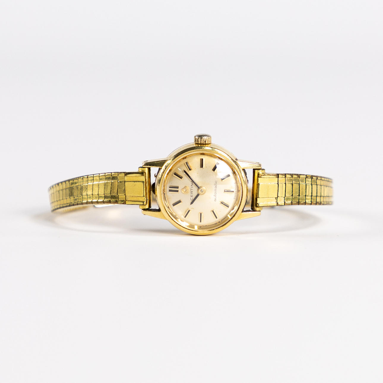 CERTINA. 18 mm, 18k guld, 60/70-tal.
