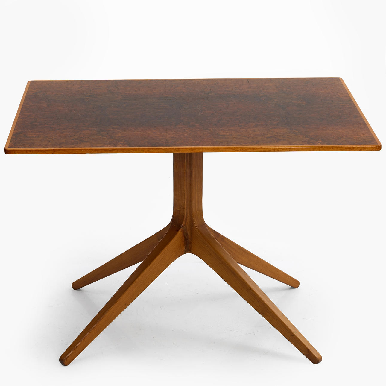 A mid-20th century table with root veneer, four-piece pillar base.