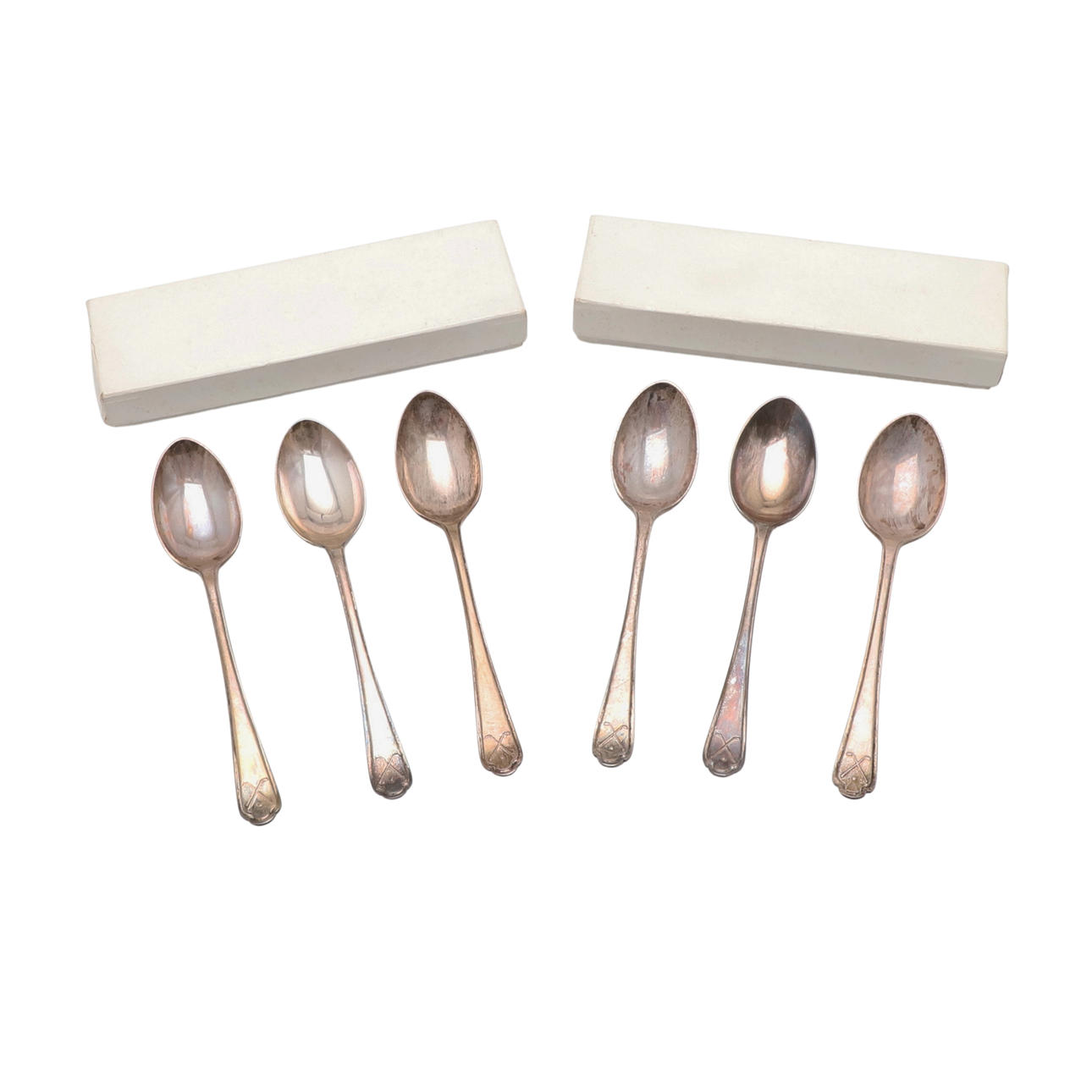 SIX SILVER TEASPOONS.